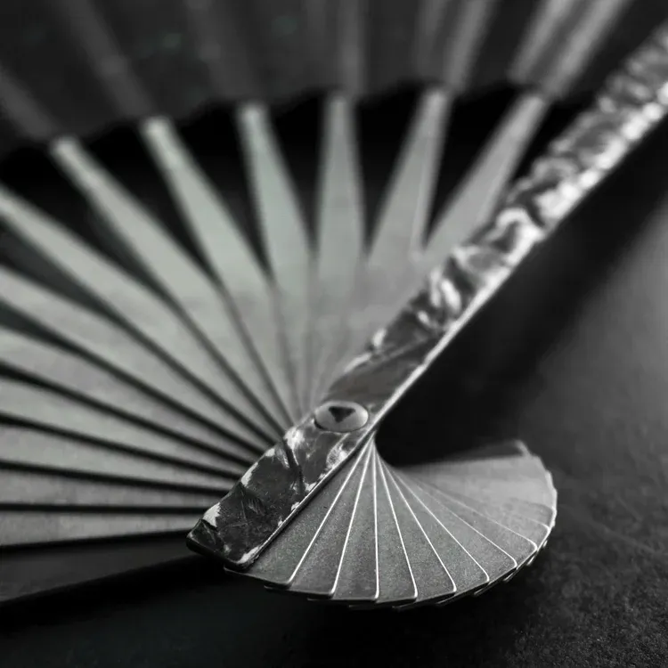 BuRan: the Titanium Hand carved Folding Fan- Rockery